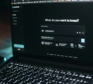Laptop screen showing a search bar.