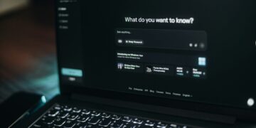 Laptop screen showing a search bar.